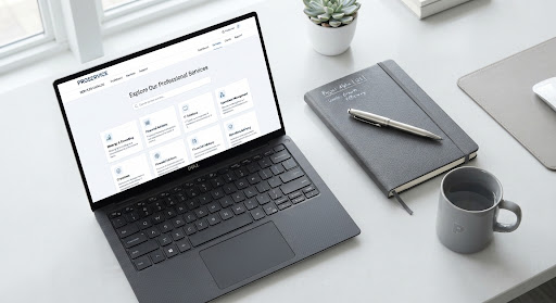 A modern executive desk with a metal pen resting on a leather notebook beside a slim laptop, lit softly in cool greys and whites.